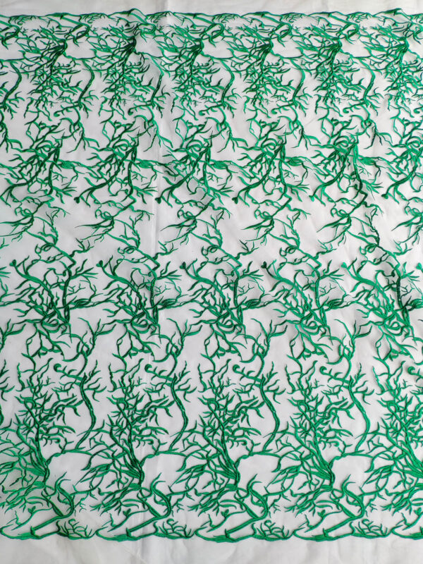 Green embroidered lace fabric on white net #80561 - Image 4