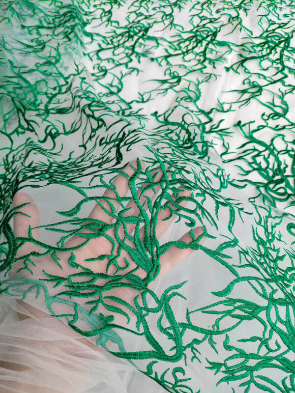 Green embroidered lace fabric on white net #80561 - Image 3