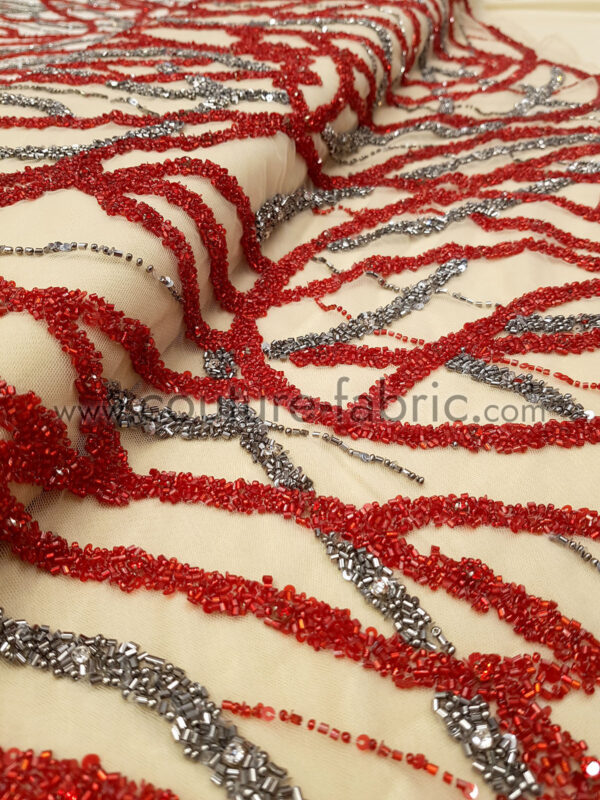 Red and gunmetal handmade lace fabric